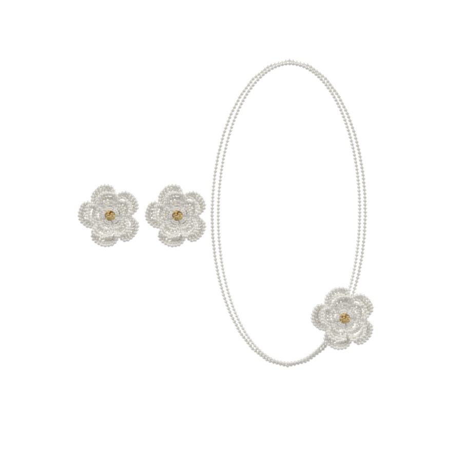 White Fullice Camellia flower earrings and matching necklace arranged as a set