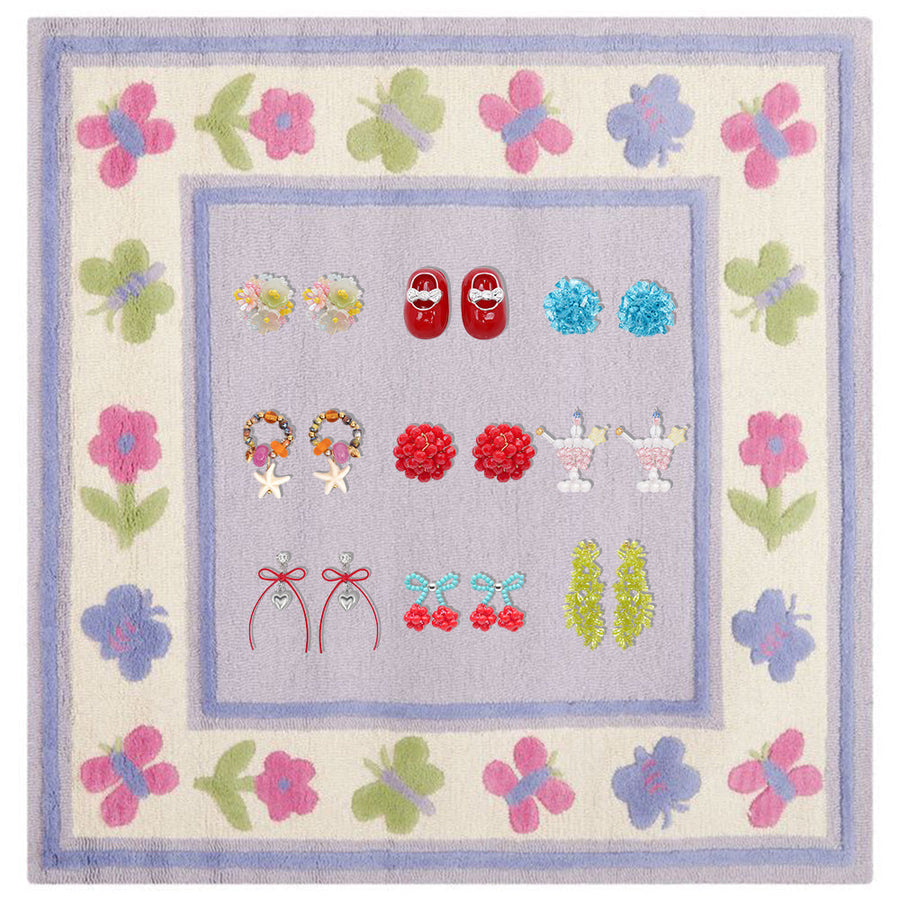 Fullice clip-on earring styles arranged in neat rows on a pastel floral display