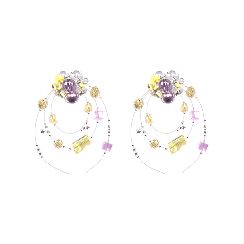 Iris Halo floral hoop earrings on a black background